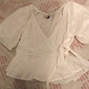 Puff sleeve peplum wrap top